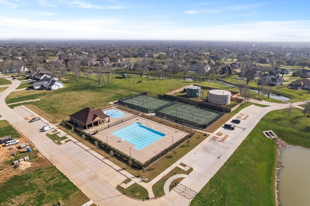 4103 Willowisp Ct, Fulshear, TX 77441 - aerial perspective of suburban area featuring a pool and a large body of water