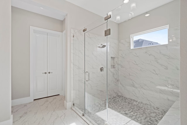 4103 Willowisp Ct, Fulshear, TX 77441 - full bath with a marble finish shower and marble finish flooring
