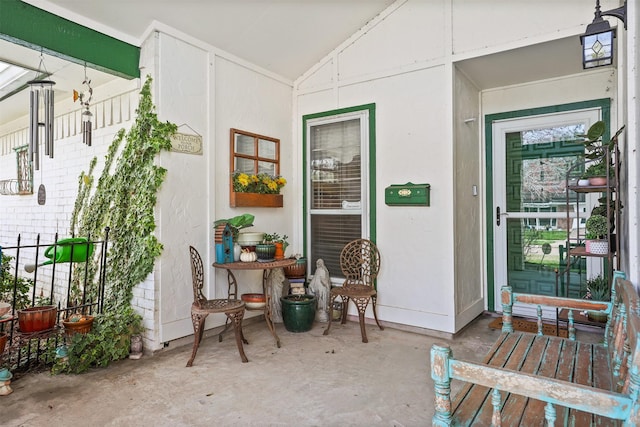 doorway to property with stucco siding