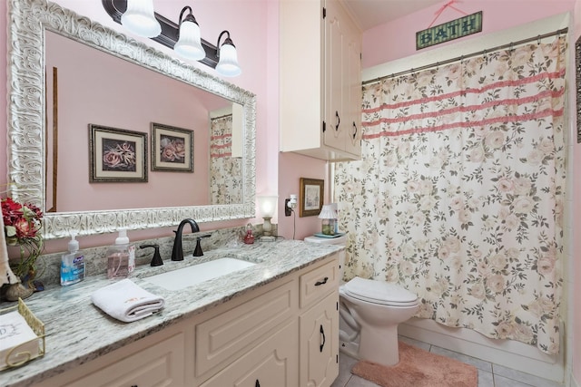 full bathroom with shower / tub combo with curtain, vanity, toilet, and tile patterned floors