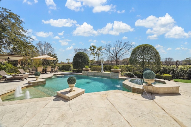 view of pool featuring a patio, a fenced in pool, and an in ground hot tub