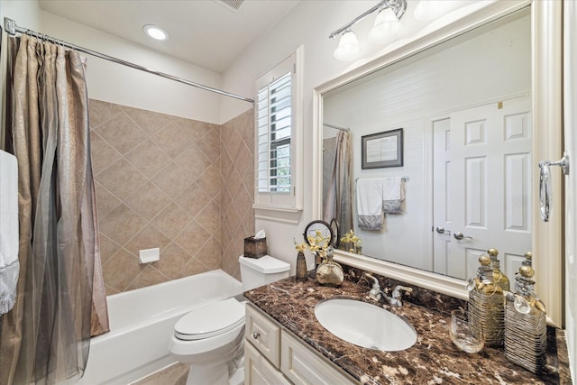 bathroom featuring vanity, toilet, and shower / bathtub combination with curtain