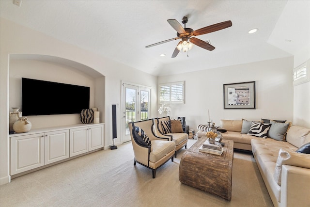 living area featuring recessed lighting, light colored carpet, a ceiling fan, and lofted ceiling