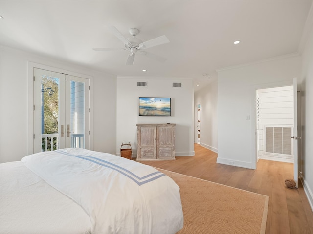 bedroom with crown molding, visible vents, and access to exterior