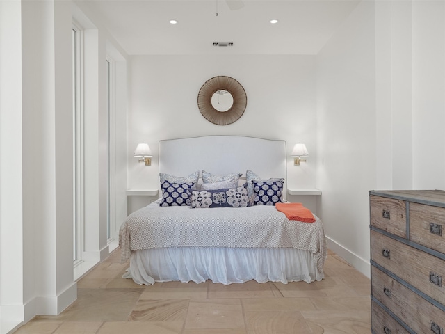 bedroom with recessed lighting and baseboards