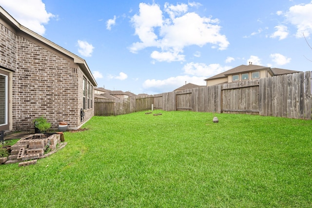 view of yard featuring a fenced backyard