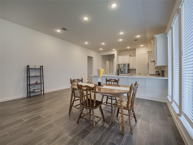 dining area with recessed lighting, visible vents, dark wood-style flooring, and baseboards