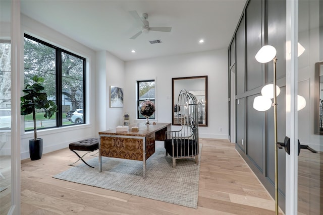 office area featuring light wood finished floors, visible vents, baseboards, recessed lighting, and a ceiling fan