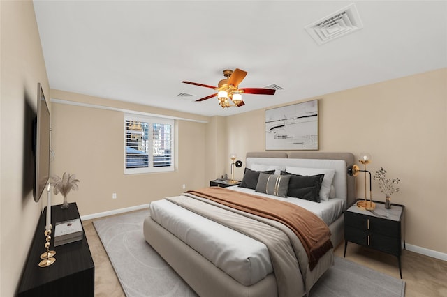 bedroom with visible vents, ceiling fan, and baseboards