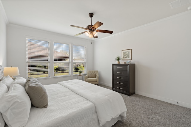 bedroom featuring baseboards, light carpet, ceiling fan, and crown molding