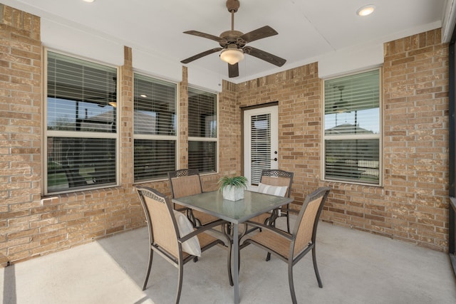 view of patio / terrace featuring outdoor dining space and a ceiling fan