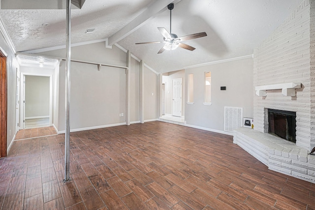 unfurnished living room featuring lofted ceiling with beams, a brick fireplace, visible vents, and dark wood-style flooring