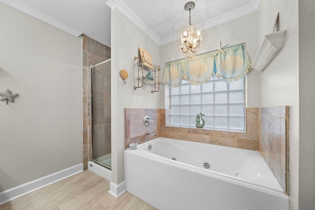 full bath featuring ornamental molding, baseboards, a shower stall, and a whirlpool tub