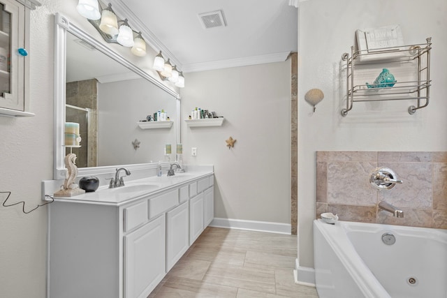 full bathroom with visible vents, a sink, and ornamental molding