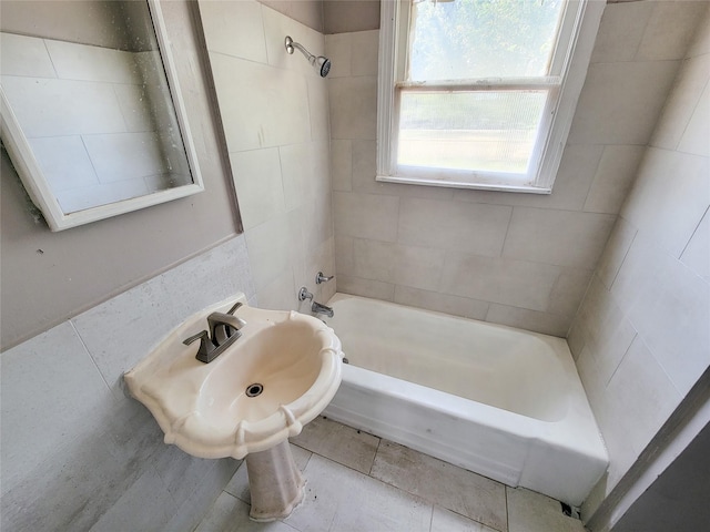 bathroom with bathing tub / shower combination