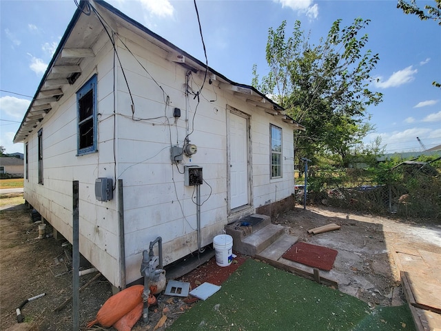 view of property exterior with entry steps