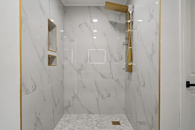 full bathroom featuring a marble finish shower