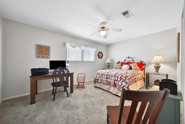 bedroom with carpet floors, visible vents, ceiling fan, and baseboards