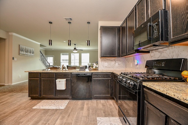 kitchen with a ceiling fan, light stone counters, visible vents, black appliances, and light wood-style floors