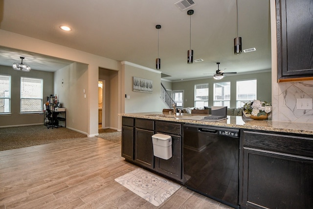 kitchen with light wood-style flooring, dishwasher, light stone counters, visible vents, and open floor plan