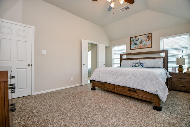 carpeted bedroom with vaulted ceiling, ceiling fan, baseboards, and visible vents