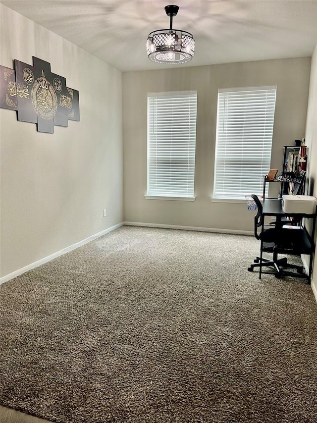 office with carpet floors and baseboards
