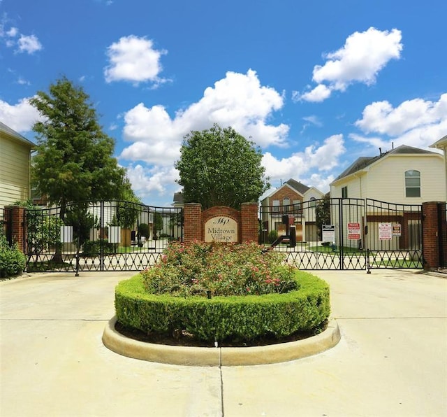 exterior space with a gate and fence