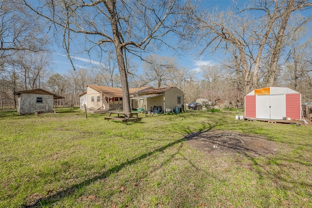 view of yard with a shed and an outdoor structure