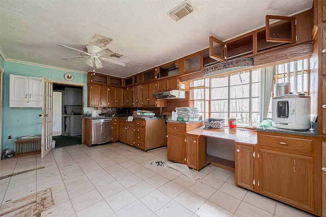 kitchen featuring brown cabinets, visible vents, dishwasher, and under cabinet range hood