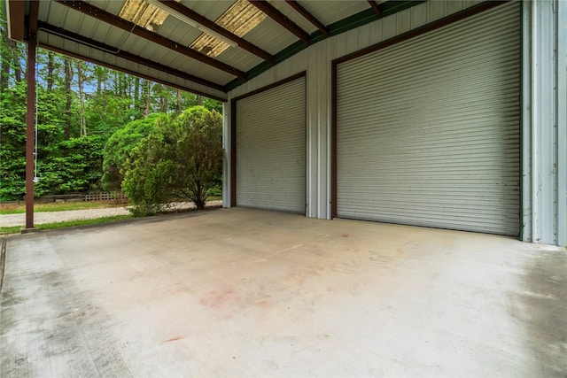 garage featuring a carport