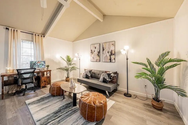 sitting room featuring vaulted ceiling with beams, wood finished floors, and baseboards