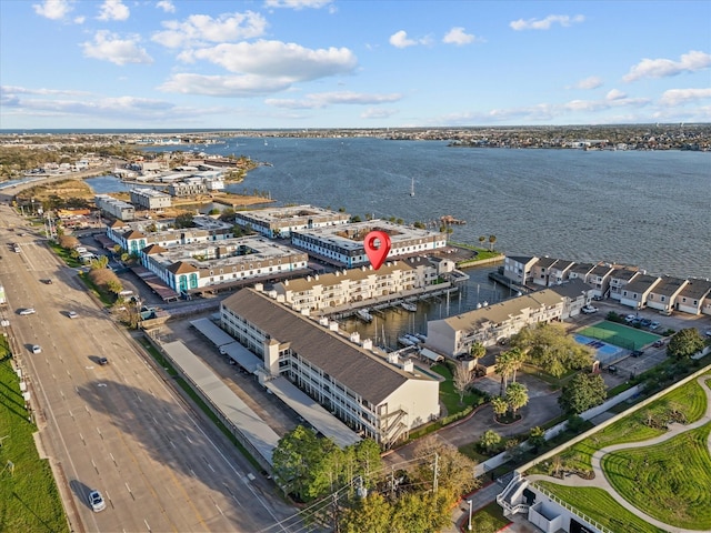 birds eye view of property featuring a water view