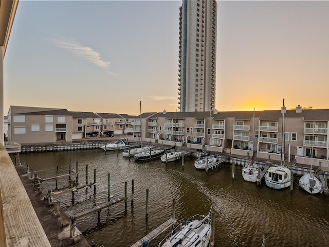 property view of water featuring a boat dock