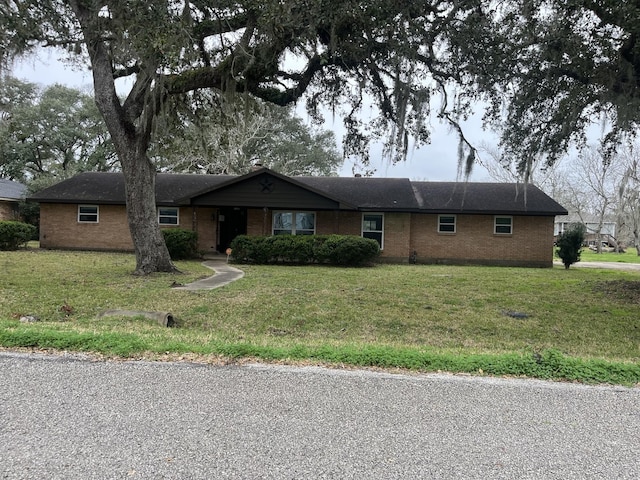 1107 Hallie St, Sweeny, TX 77480 - single story home featuring a front lawn and brick siding