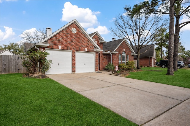 view of front of home featuring brick siding, a front yard, a chimney, a garage, and driveway