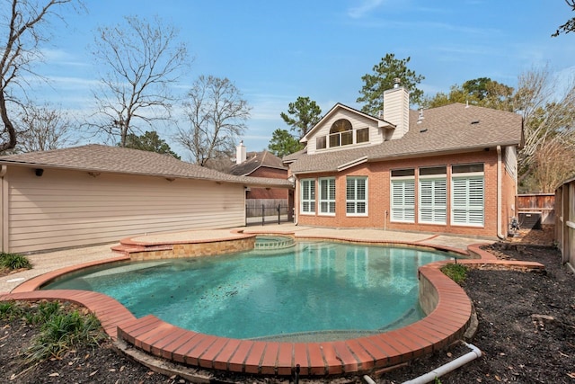 view of pool with a patio area, a fenced backyard, and a fenced in pool