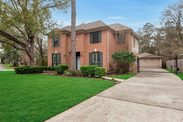 view of front of property with brick siding, a front lawn, and a gate