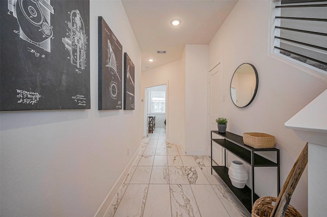 corridor featuring recessed lighting, marble finish floor, visible vents, and baseboards