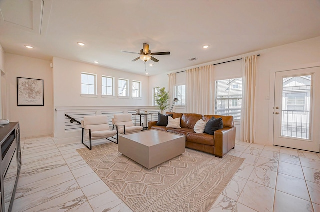 living room featuring recessed lighting, marble finish floor, visible vents, and ceiling fan