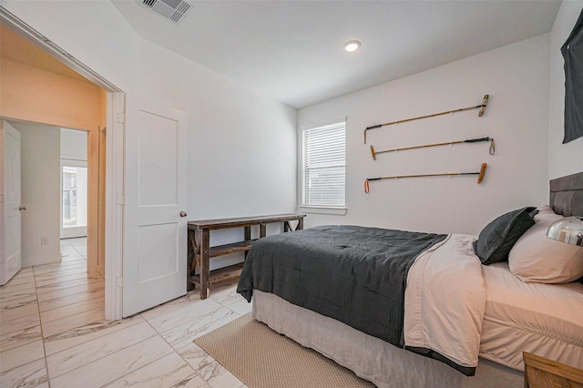 bedroom with recessed lighting, visible vents, and marble finish floor