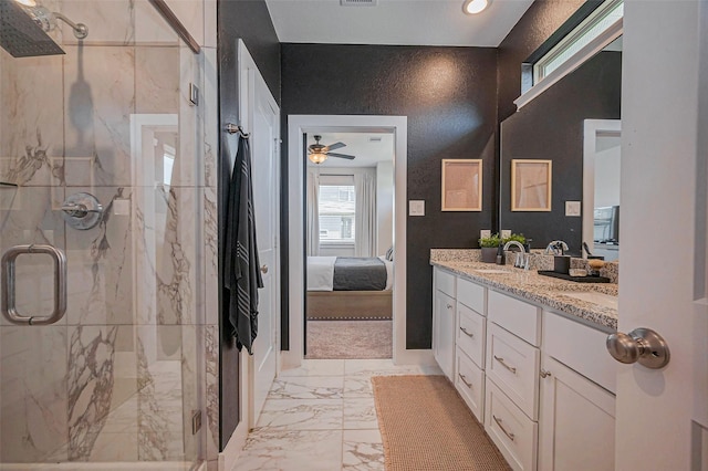 bathroom with a shower stall, double vanity, marble finish floor, ensuite bath, and a sink