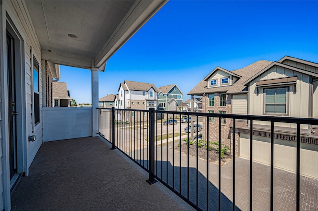 balcony featuring a residential view