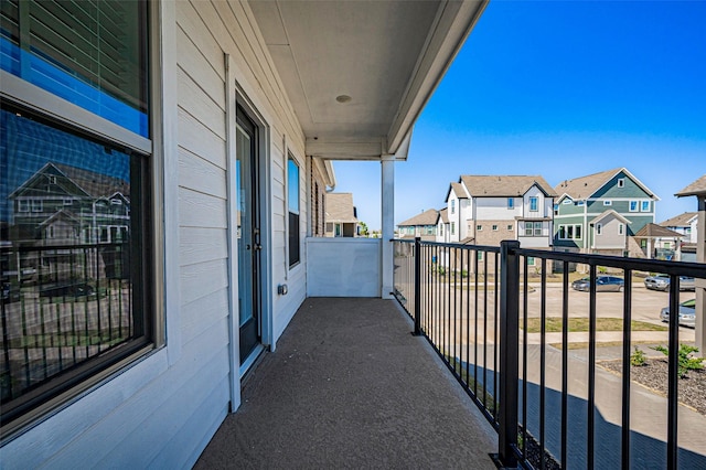 balcony featuring a residential view