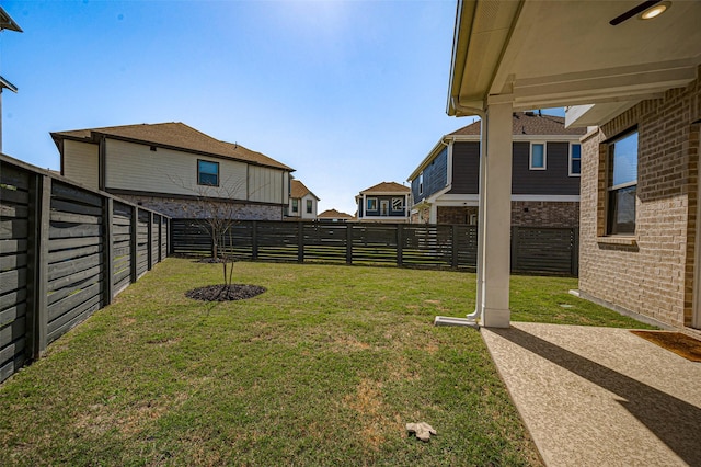 view of yard featuring a fenced backyard