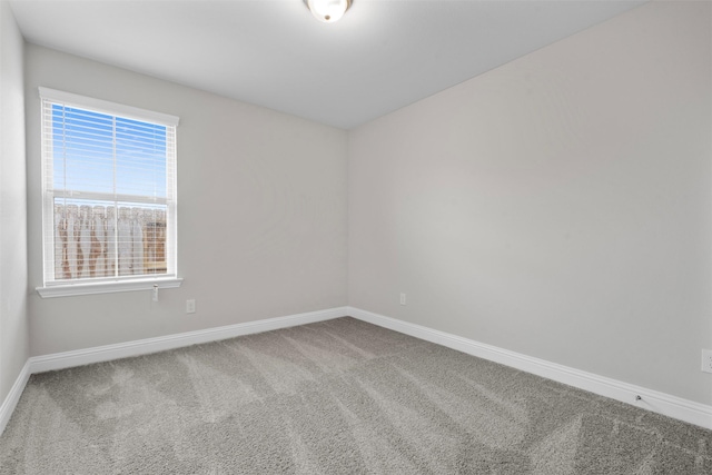 13540 Diamond Reef Ln, Texas City, TX 77568 - spare room featuring baseboards and carpet flooring