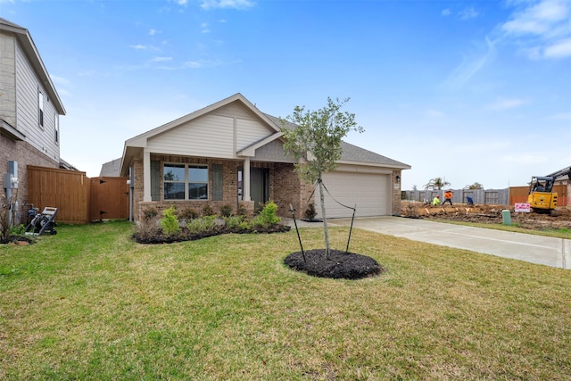 13540 Diamond Reef Ln, Texas City, TX 77568 - view of front of home featuring brick siding, concrete driveway, a front yard, fence, and a garage