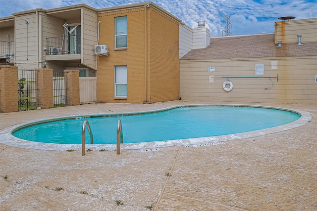 pool featuring fence