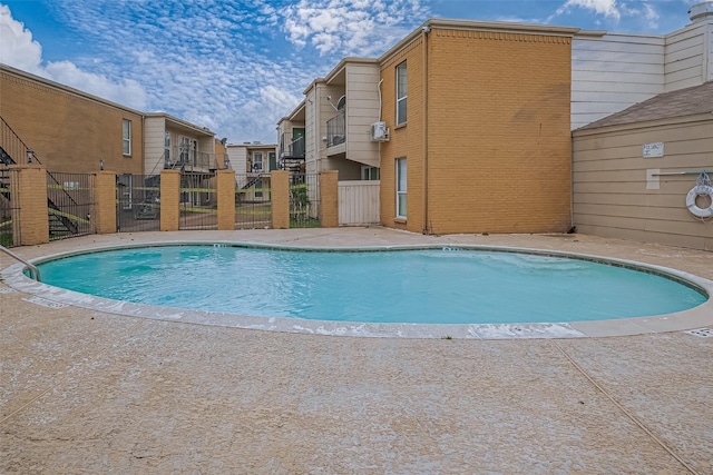 pool featuring fence