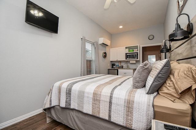 bedroom with a wall unit AC, recessed lighting, dark wood-type flooring, a ceiling fan, and baseboards