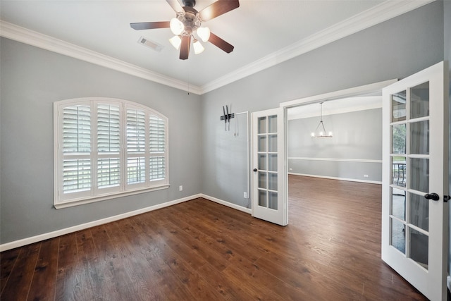 empty room with french doors, visible vents, baseboards, and wood finished floors